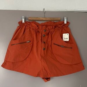 Free People Movement High-Waisted Orange Button-Up Drawstring Shorts